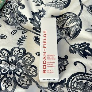 Rodan + Fields Detangle & leave-in treatment.